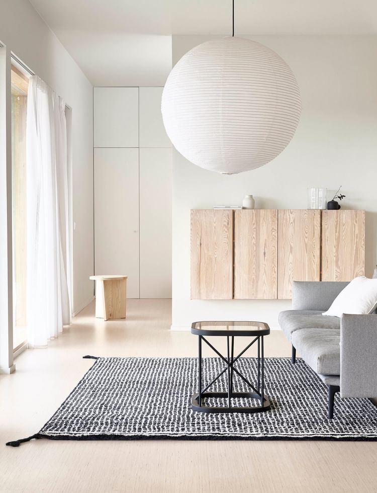 Woodnotes hand knotted grid carpet black insitu haute living