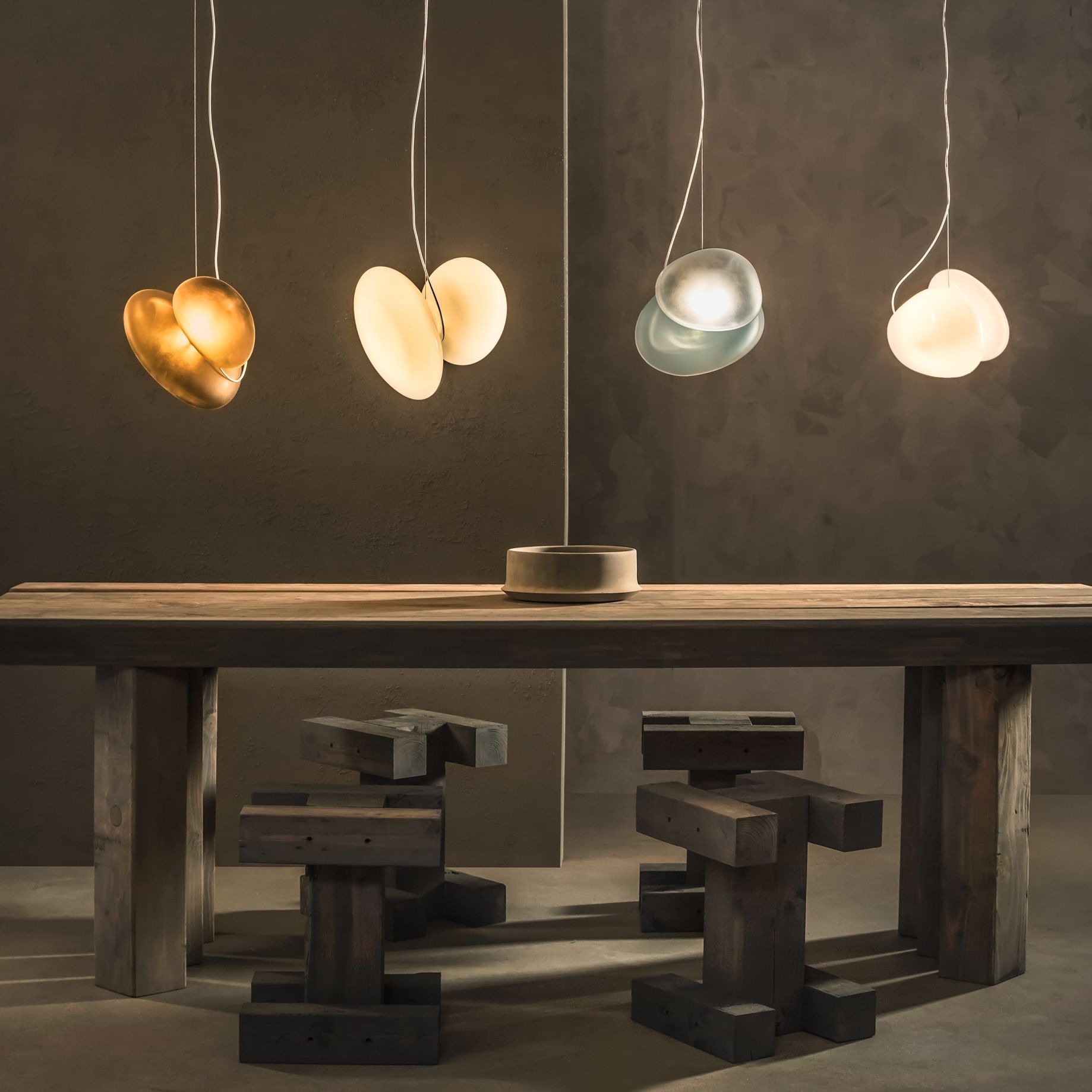Andlight pebble pendant lit insitu haute living
